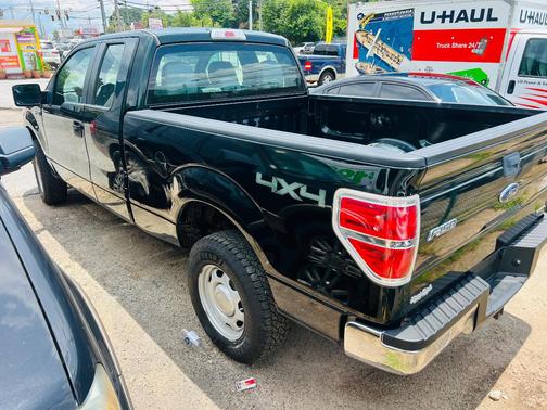 Green 2014 Ford F-150 XLT