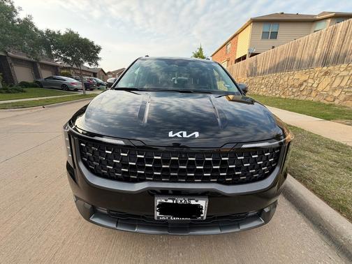 Black 2025 Kia Carnival SX