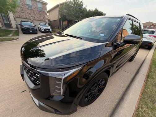 Black 2025 Kia Carnival SX