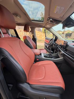 Black 2025 Kia Carnival SX