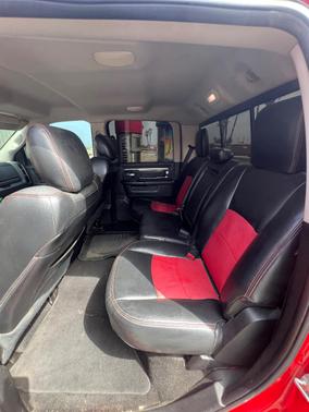 Red 2014 RAM 1500 Sport