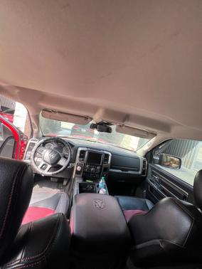 Red 2014 RAM 1500 Sport