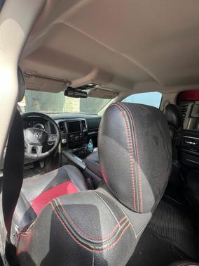 Red 2014 RAM 1500 Sport