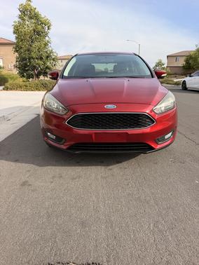 Red 2015 Ford Focus SE