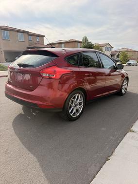 Red 2015 Ford Focus SE