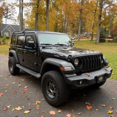 Black 2023 Jeep Wrangler Sport S