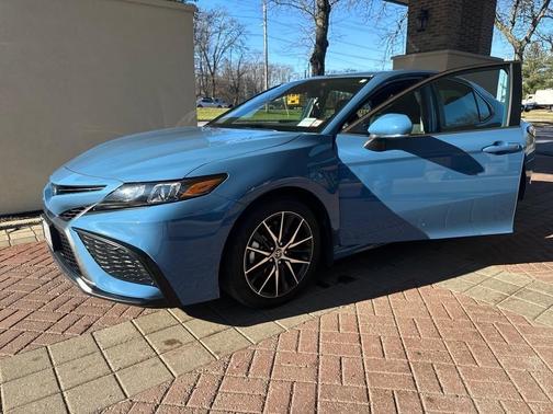 Blue 2024 Toyota Camry Hybrid SE