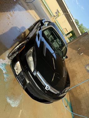 Black 2008 Saturn Sky Red Line