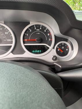 Red 2008 Jeep Wrangler Sahara