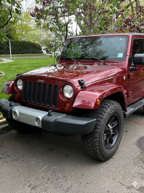 Red 2008 Jeep Wrangler Sahara