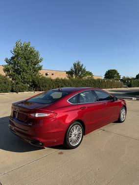 Red 2015 Ford Fusion SE