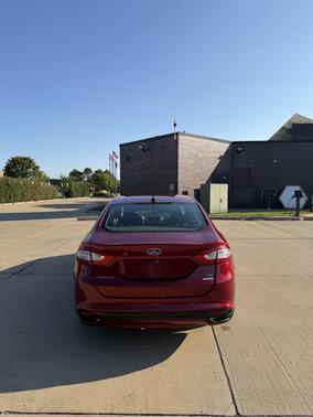 Red 2015 Ford Fusion SE