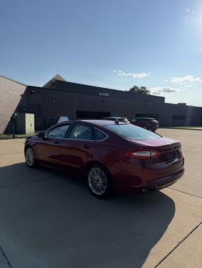 Red 2015 Ford Fusion SE