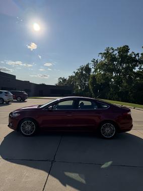 Red 2015 Ford Fusion SE