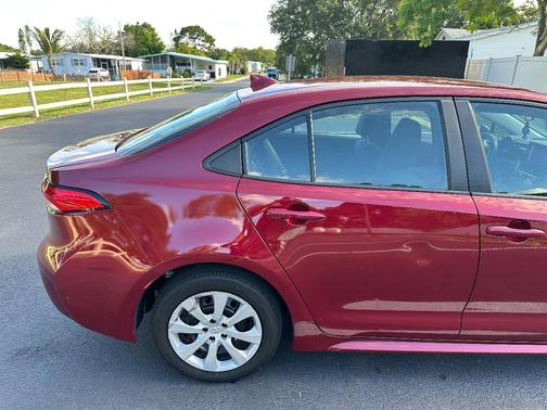 Red 2023 Toyota Corolla LE