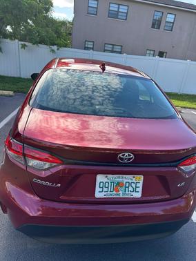 Red 2023 Toyota Corolla LE