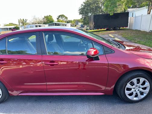 Red 2023 Toyota Corolla LE