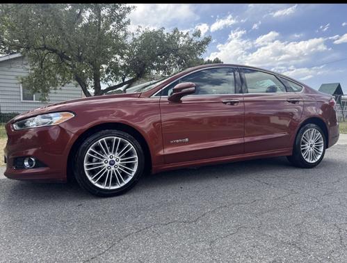 Red 2014 Ford Fusion Hybrid SE
