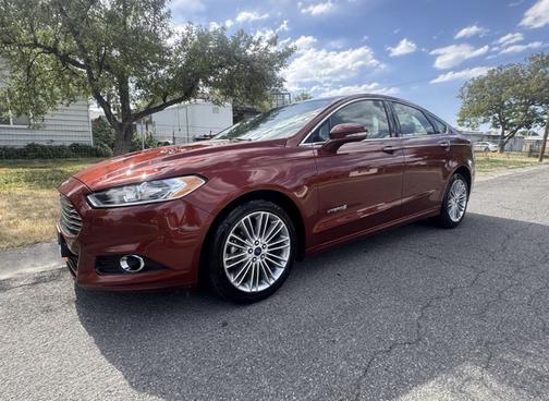 Red 2014 Ford Fusion Hybrid SE