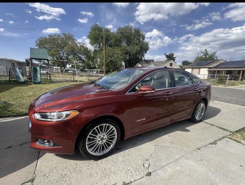 Red 2014 Ford Fusion Hybrid SE
