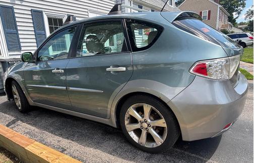 Blue 2010 Subaru Impreza Outback Sport