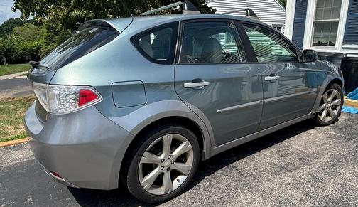 Blue 2010 Subaru Impreza Outback Sport