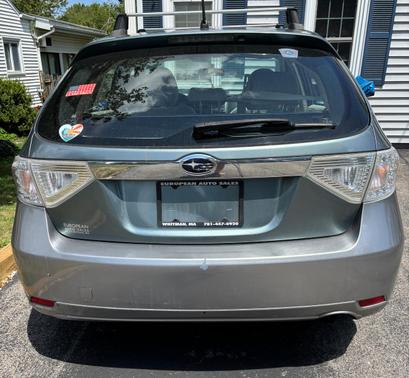 Blue 2010 Subaru Impreza Outback Sport