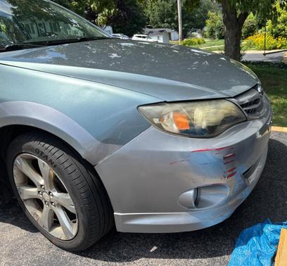 Blue 2010 Subaru Impreza Outback Sport