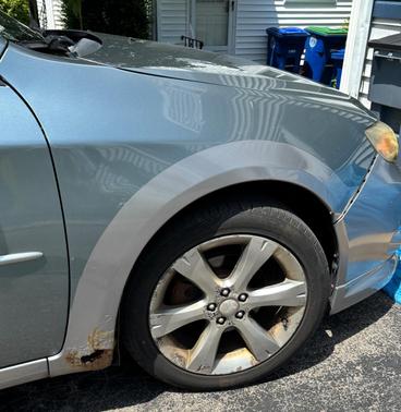 Blue 2010 Subaru Impreza Outback Sport