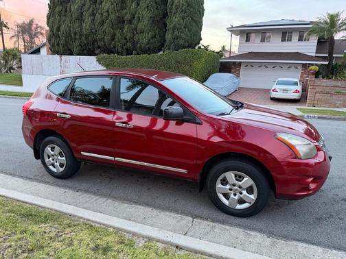 Red 2015 Nissan Rogue Select S