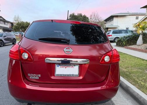 Red 2015 Nissan Rogue Select S