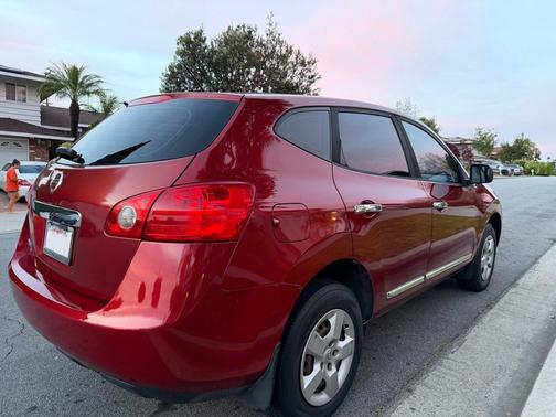 Red 2015 Nissan Rogue Select S