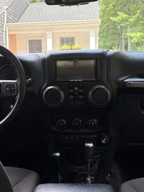 White 2015 Jeep Wrangler Unlimited Willys Wheeler