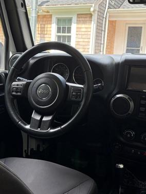White 2015 Jeep Wrangler Unlimited Willys Wheeler