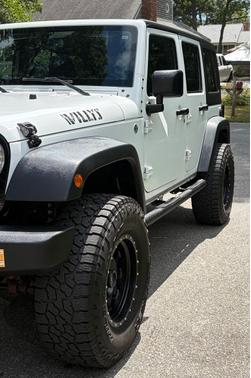 White 2015 Jeep Wrangler Unlimited Willys Wheeler