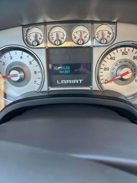 Red 2010 Ford F-150 Lariat SuperCrew