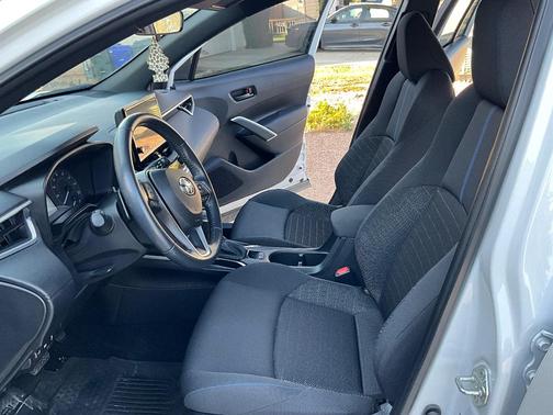 White 2023 Toyota Corolla Cross Hybrid SE