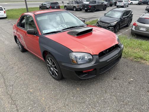 Red 2005 Subaru Impreza 2.5 RS