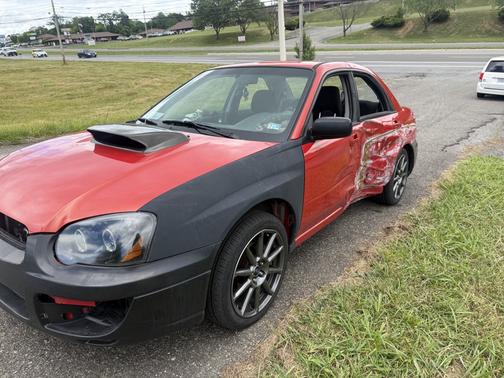 Red 2005 Subaru Impreza 2.5 RS