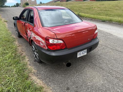 Red 2005 Subaru Impreza 2.5 RS