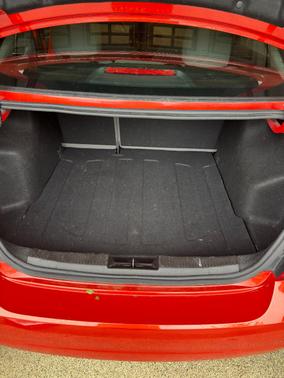 Orange 2013 Chevrolet Sonic LS