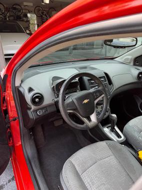 Orange 2013 Chevrolet Sonic LS