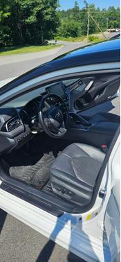 White 2021 Toyota Camry Hybrid XSE