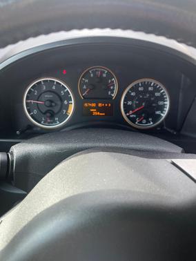 Red 2011 Nissan Titan SV