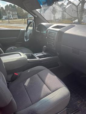 Red 2011 Nissan Titan SV