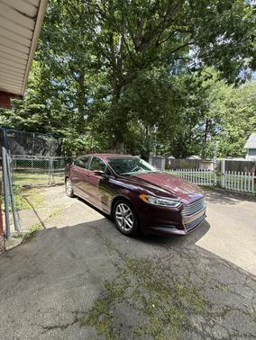 Red 2013 Ford Fusion SE