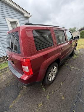 Red 2012 Jeep Patriot Sport