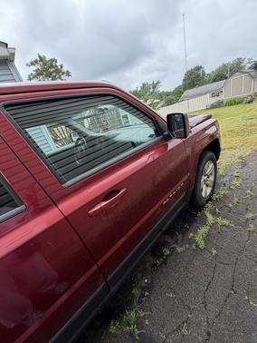 Red 2012 Jeep Patriot Sport