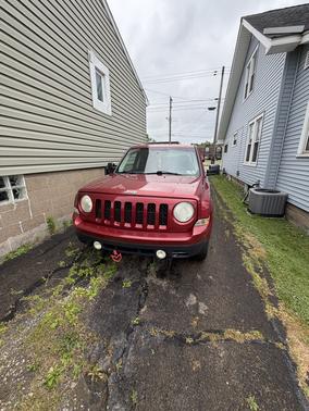 Red 2012 Jeep Patriot Sport