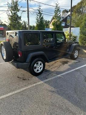 Black 2015 Jeep Wrangler Unlimited Sport